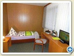Neugestaltetes Einbettzimmer